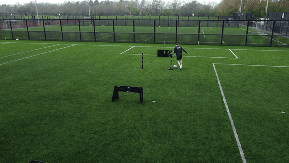 man in field using acura elite wireless circuit