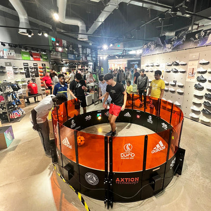 A young player using the acura elite icon fast feet in an adidas outlet store