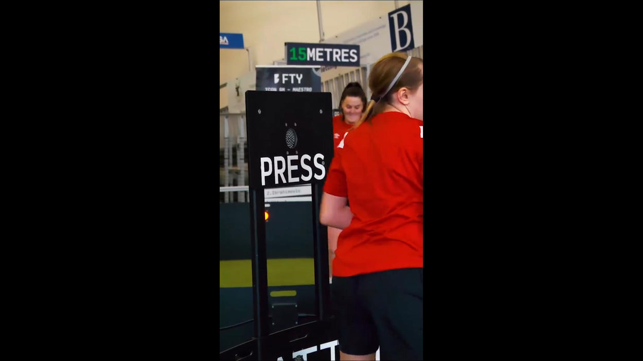 girl standing next to press panel on acura elite icon v2