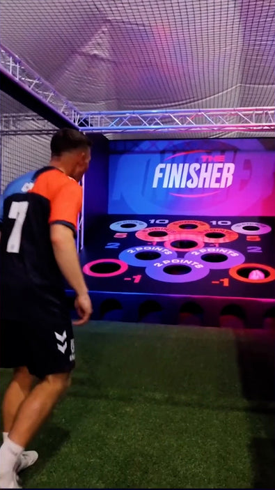 thumbnail for video of man playing football with acura elite esa panenka inside facility with pink background and colourful targets