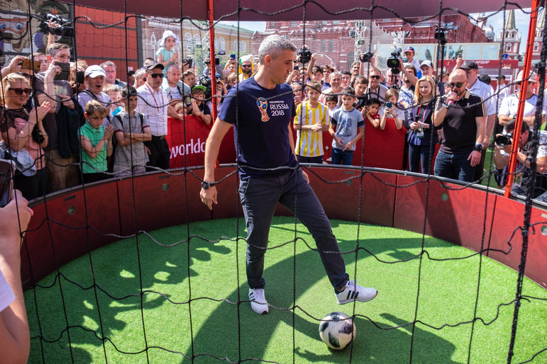hernan crespo using icon 4m 12 panel arena with red branding and crowd spectating