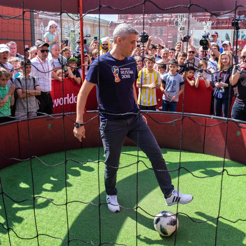 hernan crespo using icon 4m 12 panel arena with red branding and crowd spectating