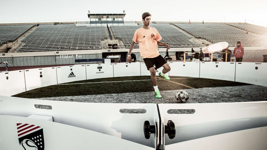 man plying football in white socal adidas acura icon arena 8m 16-panel
