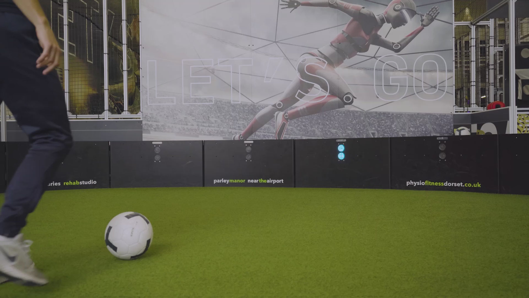video of man demonstrating how momentum game mode works on acura elite esa products inside training facility