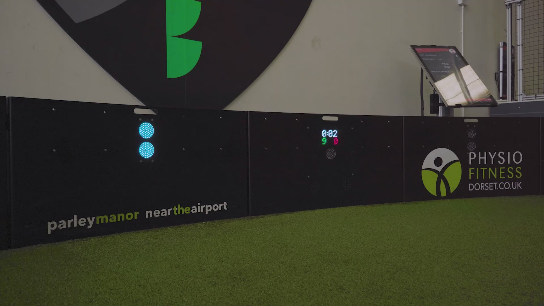 video of man demonstrating how pass finder 1 game mode works on acura elite esa products inside training facility with astro turf