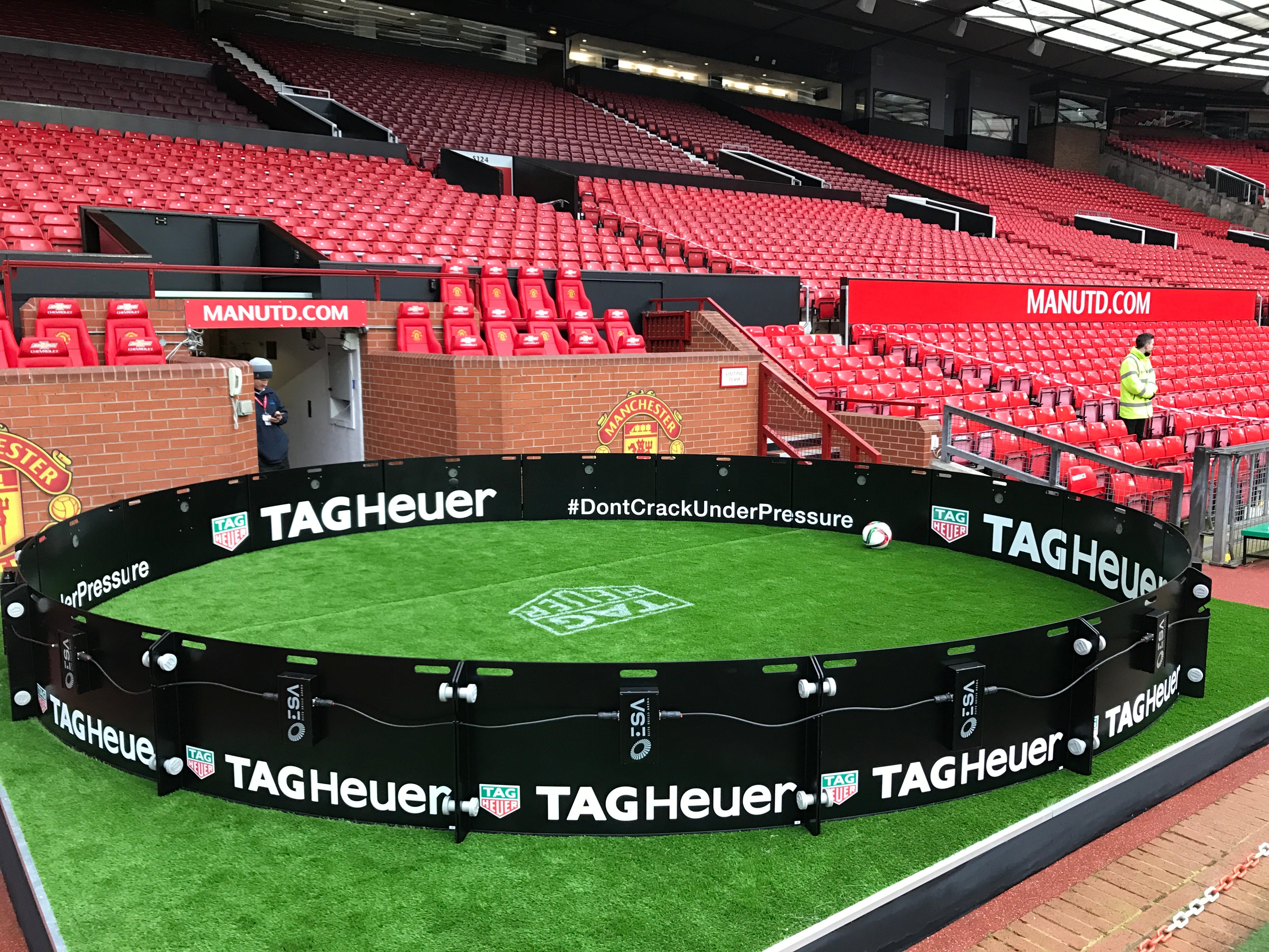 tag heur branded acura icon arena 6m 16-panel at manchester utd stadium surrounded by seating area